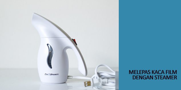 melepaskan kaca film dengan steamer melepaskan kaca film dengan steamer